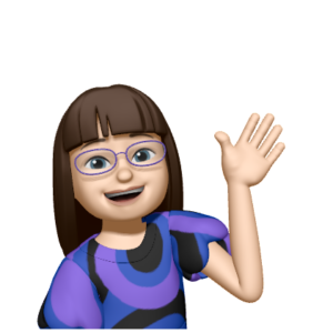Avatar of a smiling white woman with glasses, long brown hair, and a swirly purple shirt